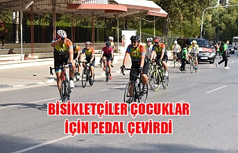 Bisikletçiler çocuklar için pedal çevirdi