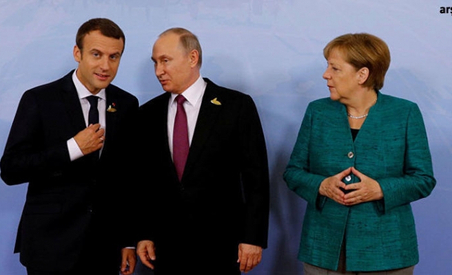 Putin, Merkel ve Macron ile Suriye'yi görüştü